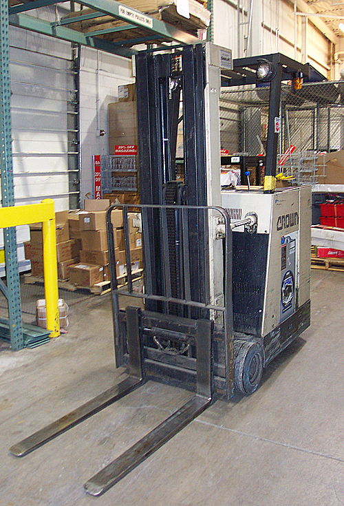 Standup forklift operator compartment intrusion